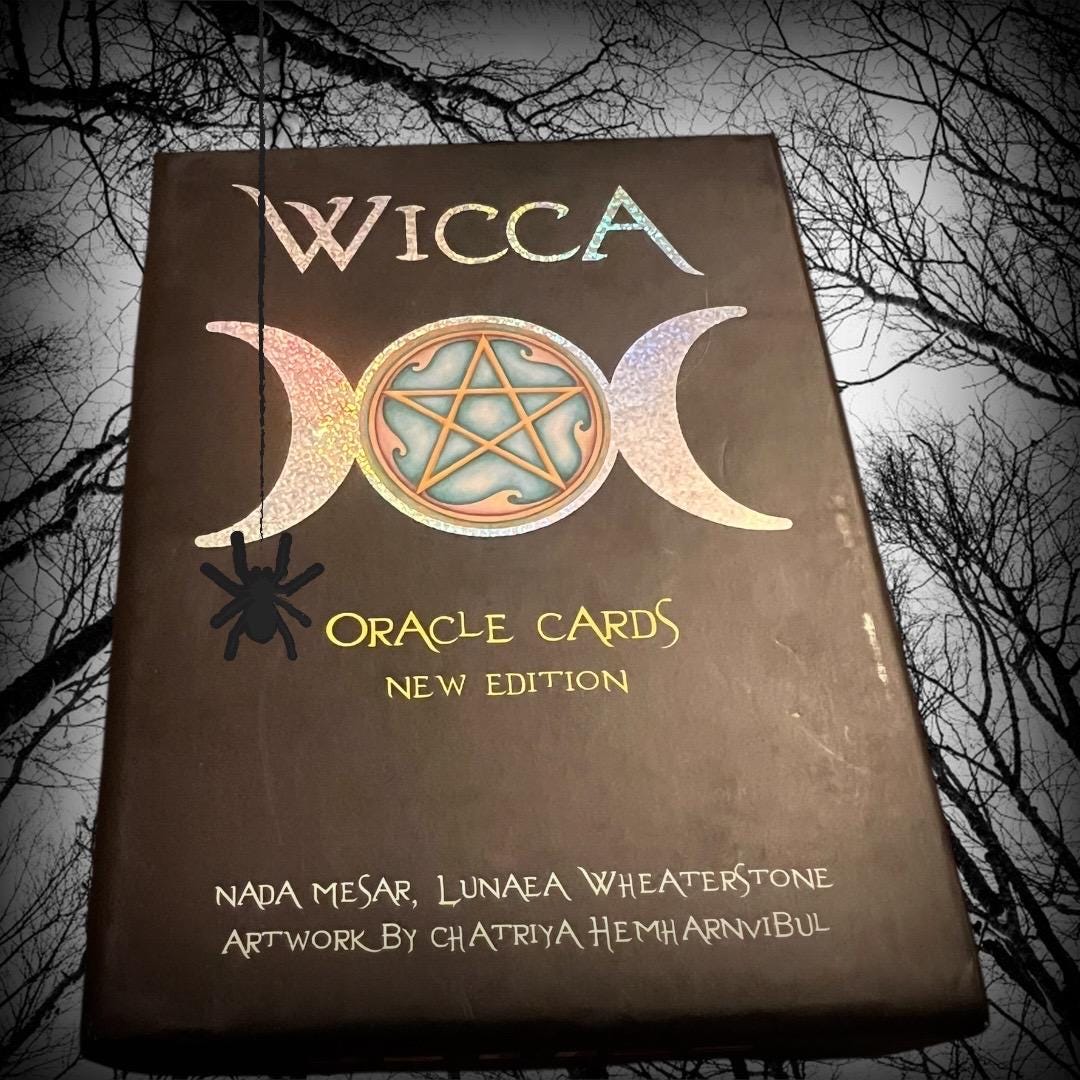 These images show the Wicca Oracle Cards (New Edition) by Nada Mesar and Lunaea Wheaterstone, with artwork by Chatriya Hemharnvibul — publis