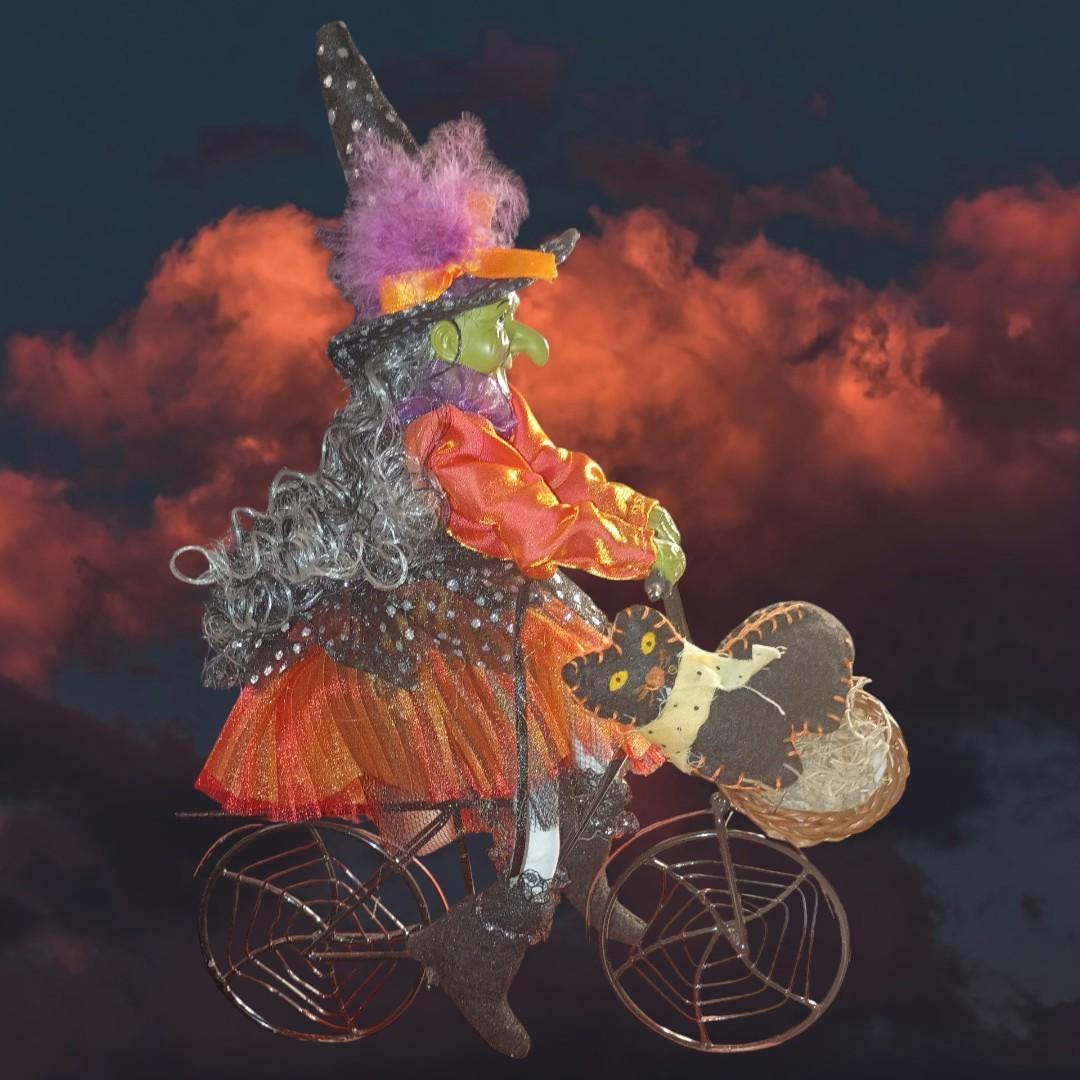 Halloween witch figurine riding bicycle with cat basket – spooky decorboost...