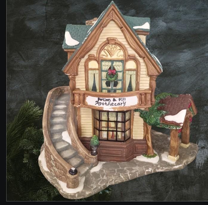 Santa’s workbench 2001 potion & pill apothecary lighted christmas village house