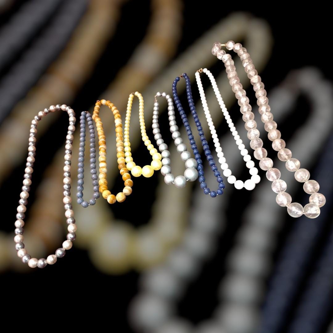 Lot of 8 beaded necklaces – assorted styles & colors – costume jewelry.