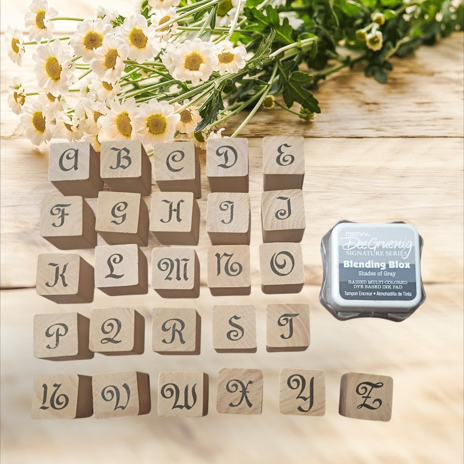 Complete set of 26 wood mounted rubber stamps –script alphabet a-z + ink pad..