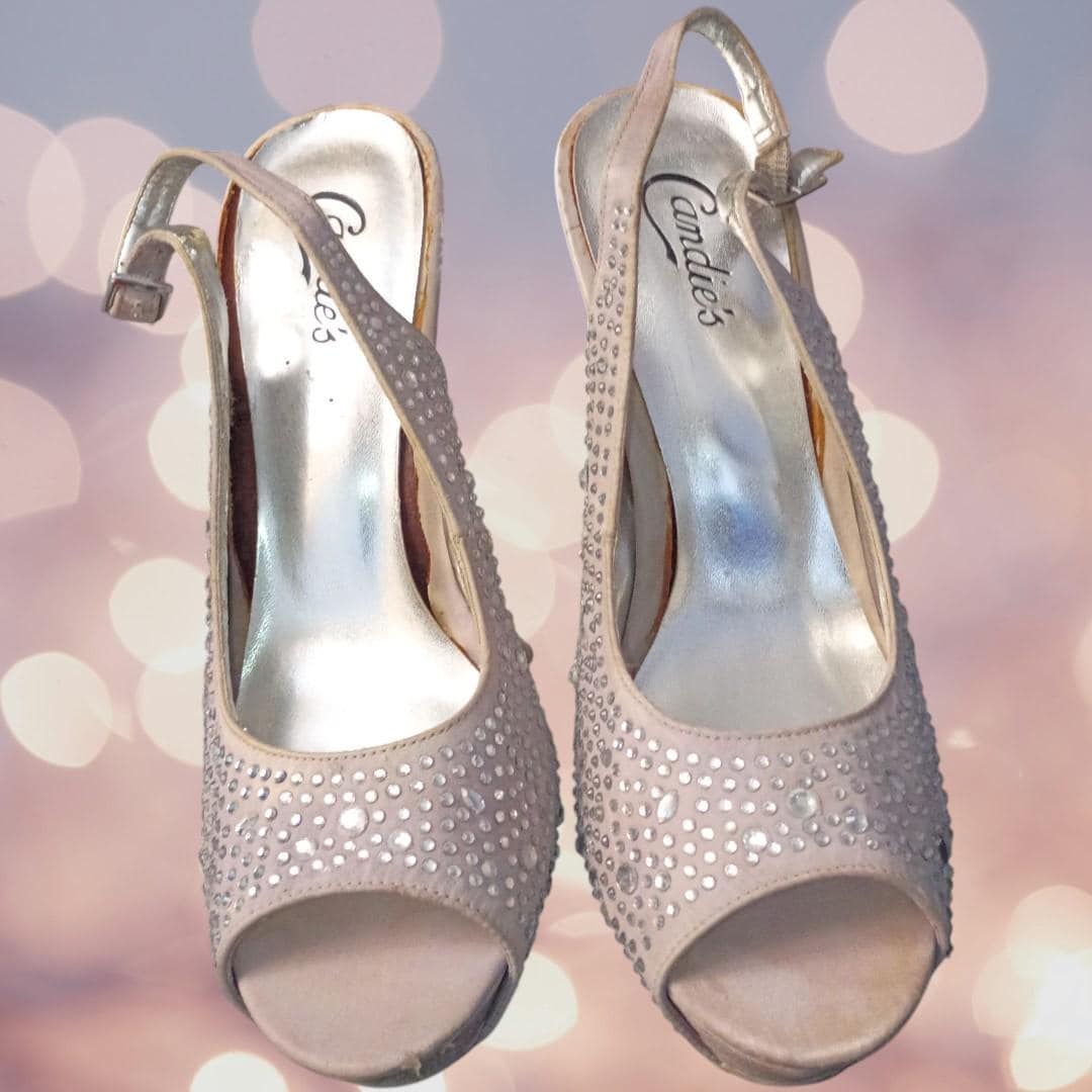 Candie’s silver rhinestone slingback heels...