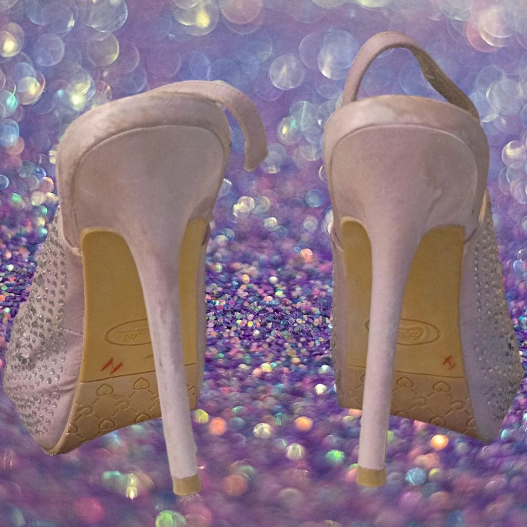 Candie’s silver rhinestone slingback heels...