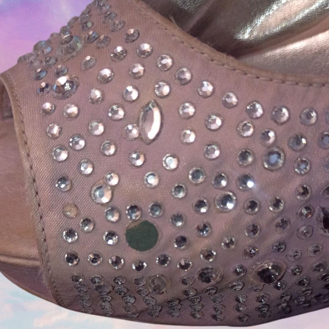Candie’s silver rhinestone slingback heels...