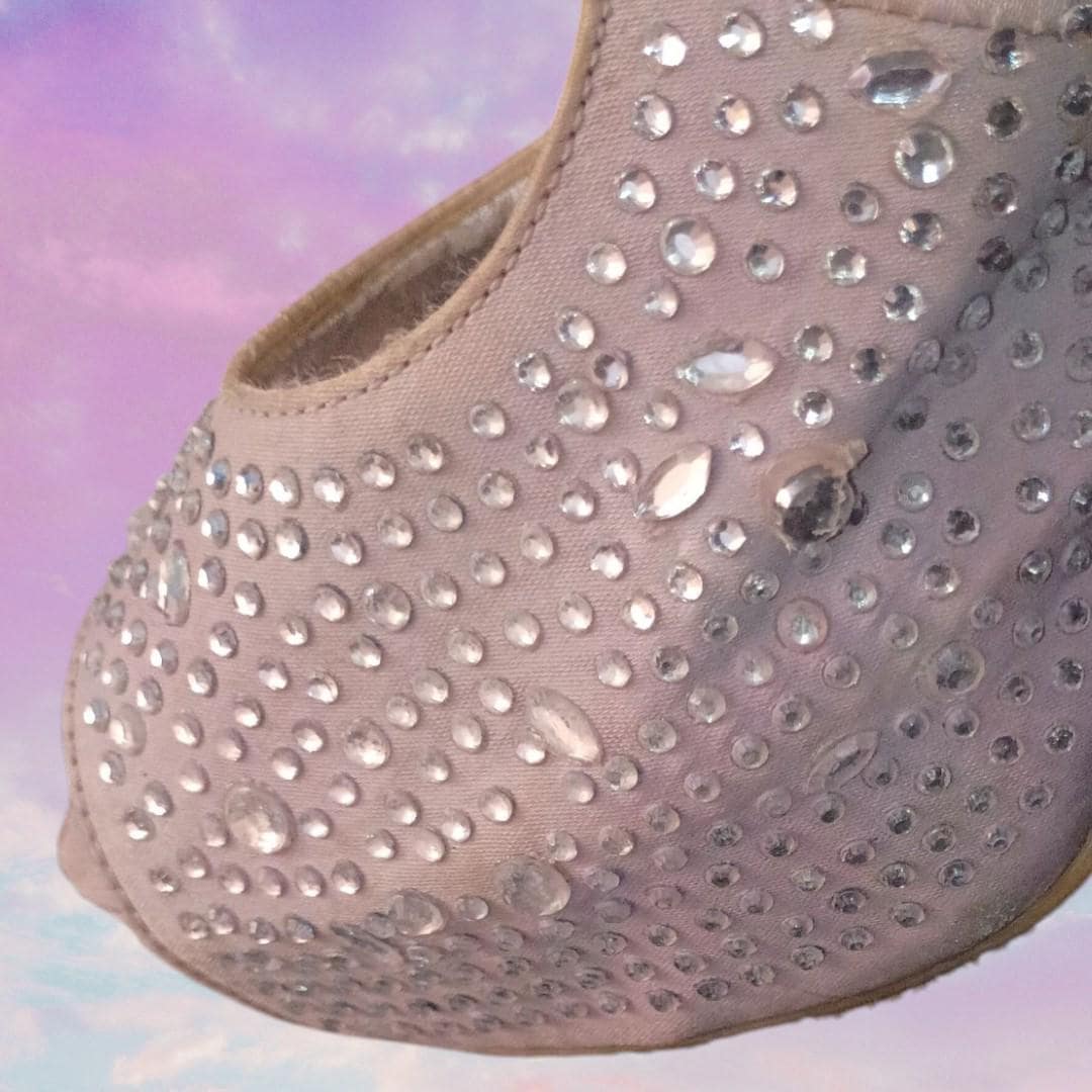 Candie’s silver rhinestone slingback heels...