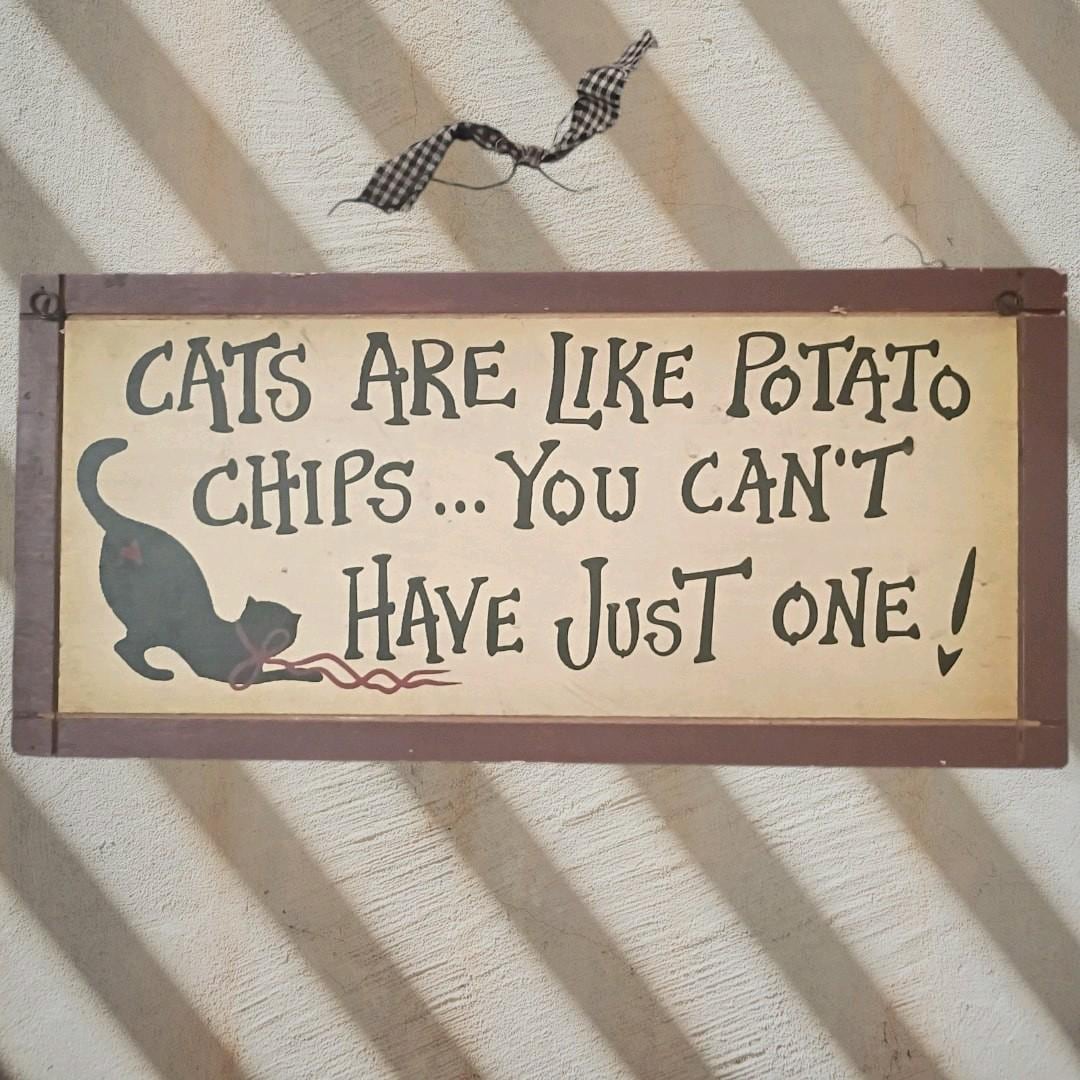 Charming "cats are like potato chips" wall sign – perfect for cat lovers!---