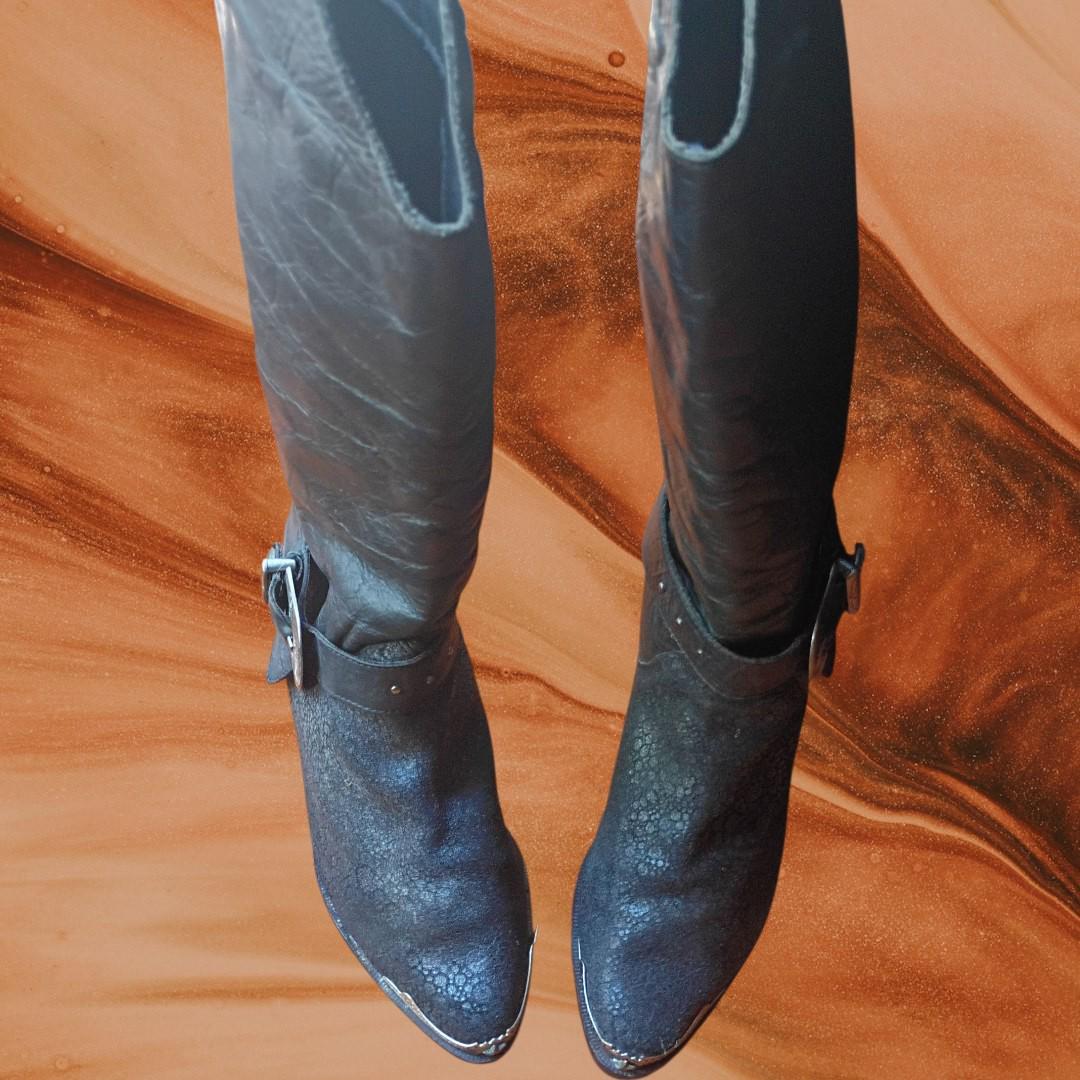 Black leather cowboy boots w/ silver buckle & heel star accents –...