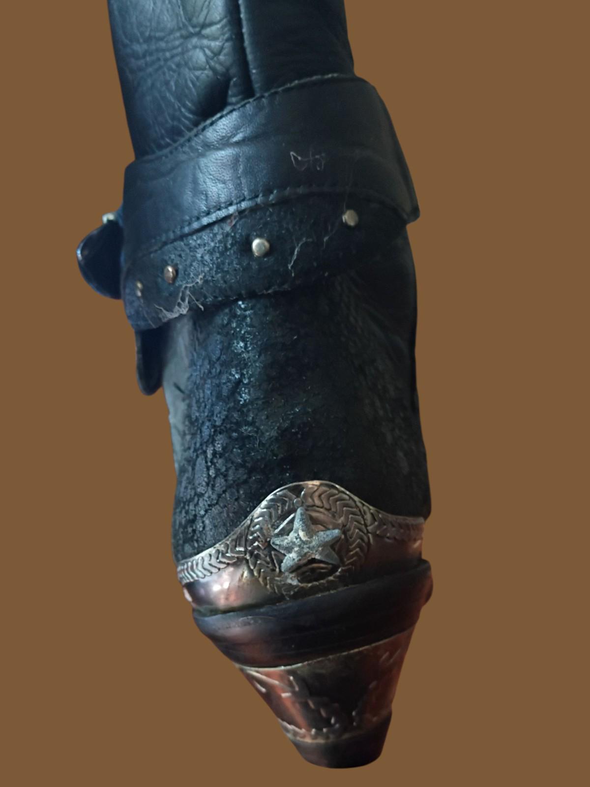 Black leather cowboy boots w/ silver buckle & heel star accents –...