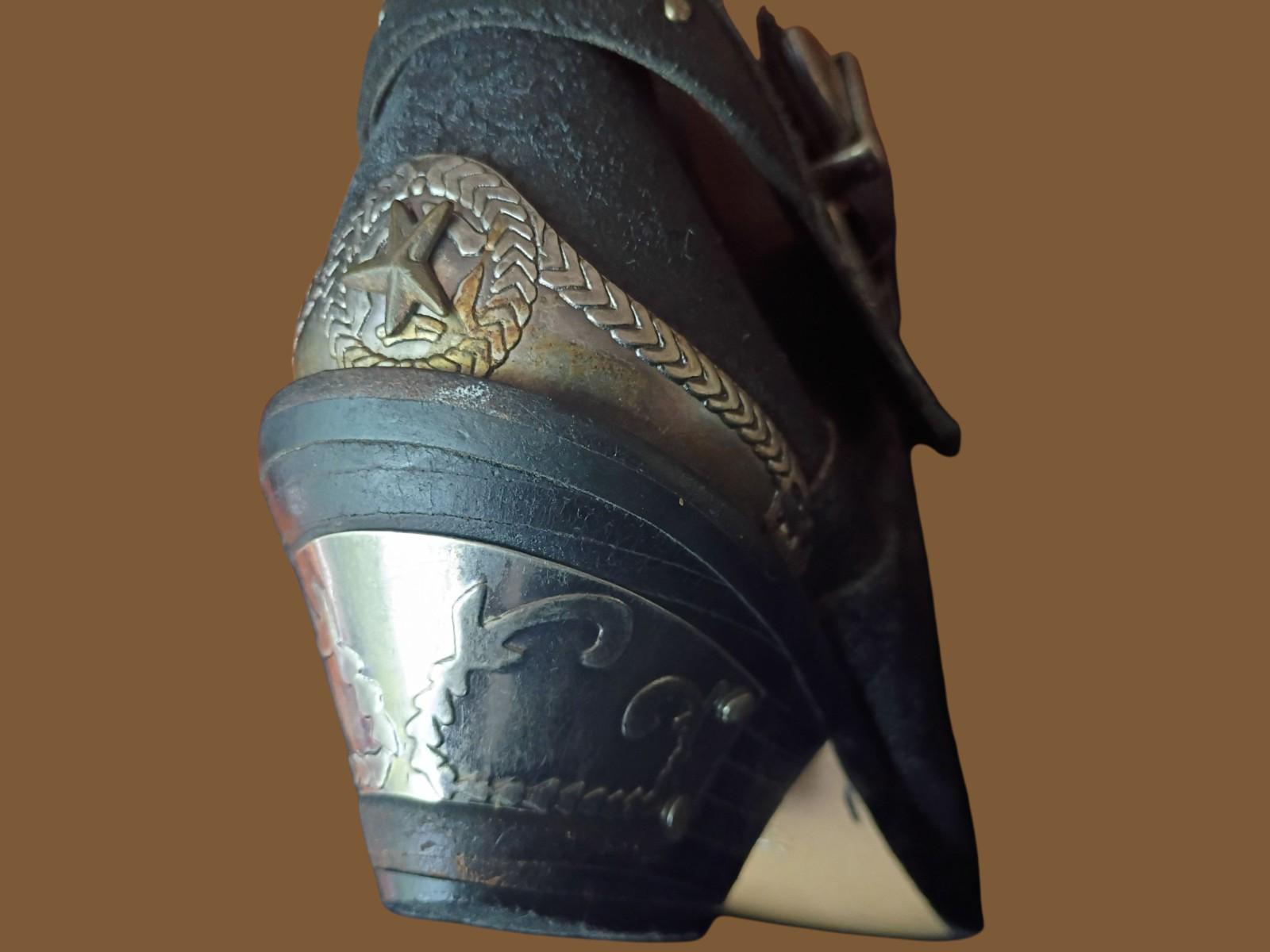 Black leather cowboy boots w/ silver buckle & heel star accents –...