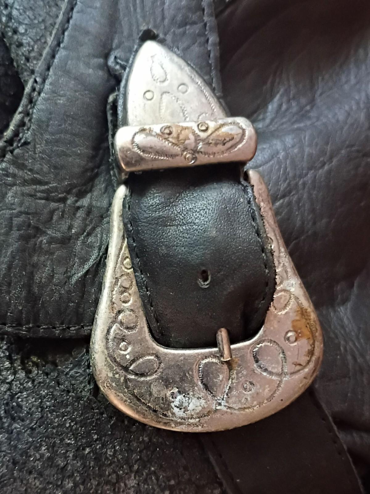 Black leather cowboy boots w/ silver buckle & heel star accents –...