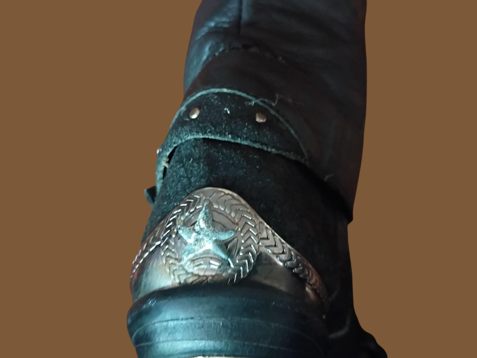 Black leather cowboy boots w/ silver buckle & heel star accents –...