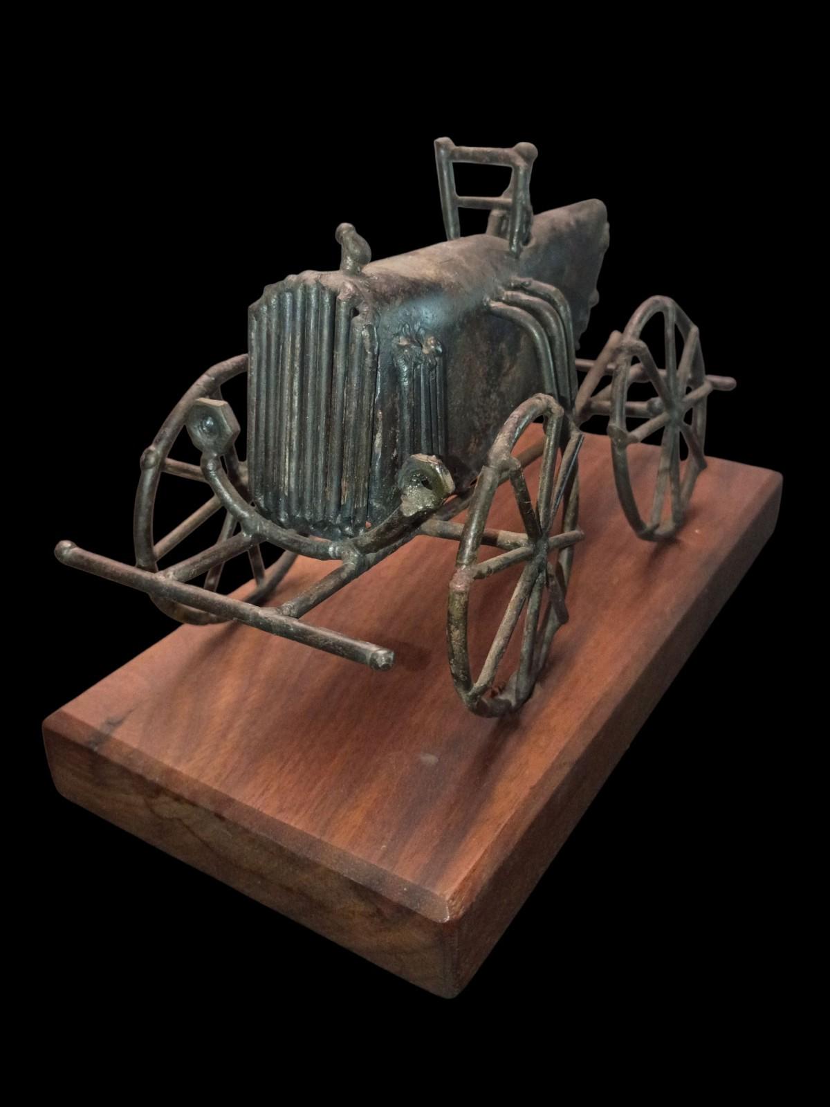Metal tractor sculpture on solid wood base – rustic farmhouse art decor