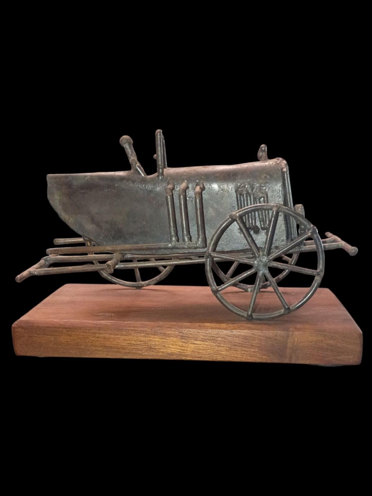 Metal tractor sculpture on solid wood base – rustic farmhouse art decor