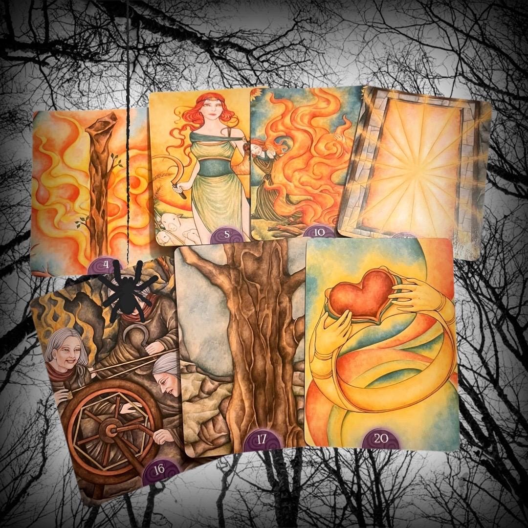 These images show the Wicca Oracle Cards (New Edition) by Nada Mesar and Lunaea Wheaterstone, with artwork by Chatriya Hemharnvibul — publis
