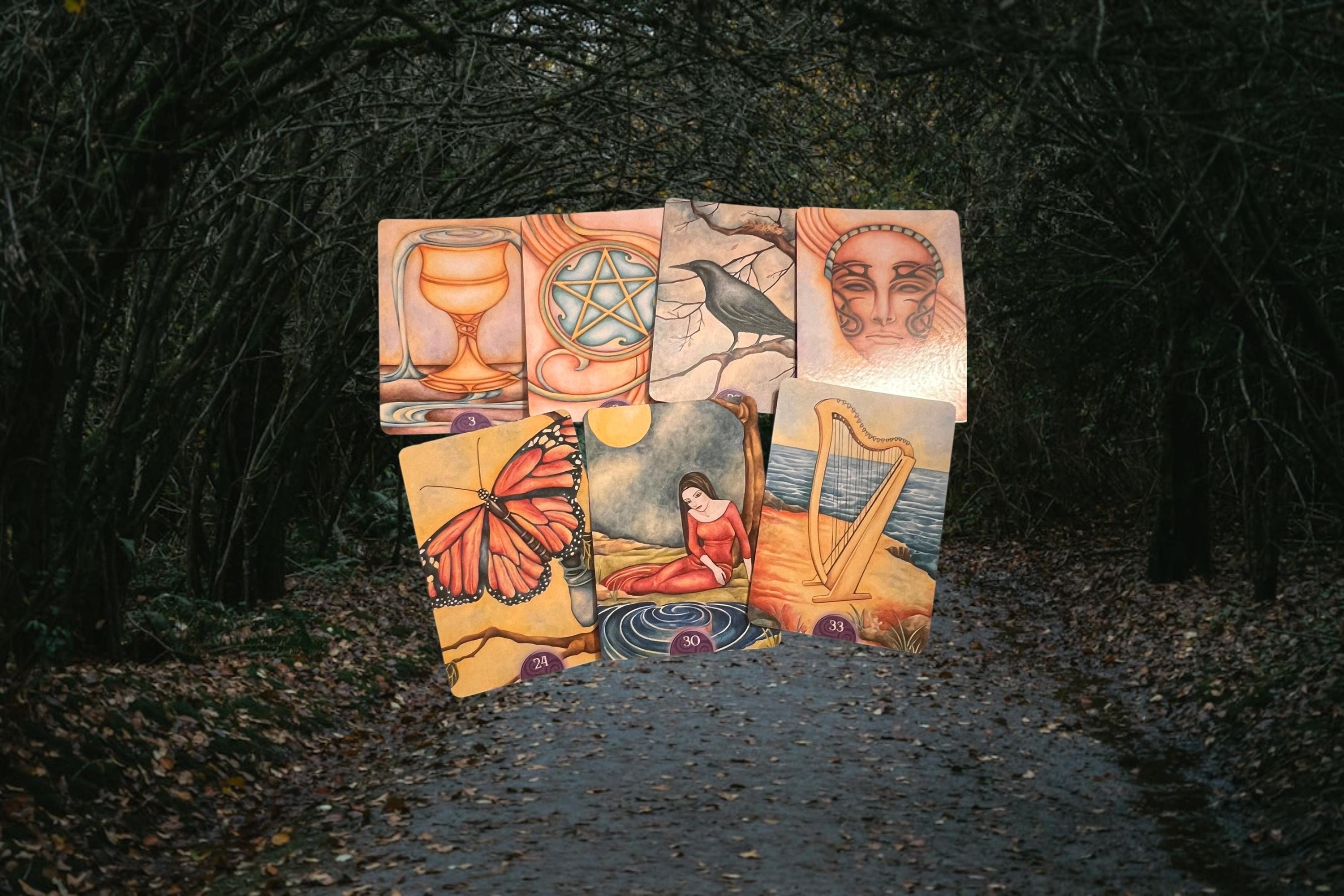 These images show the Wicca Oracle Cards (New Edition) by Nada Mesar and Lunaea Wheaterstone, with artwork by Chatriya Hemharnvibul — publis